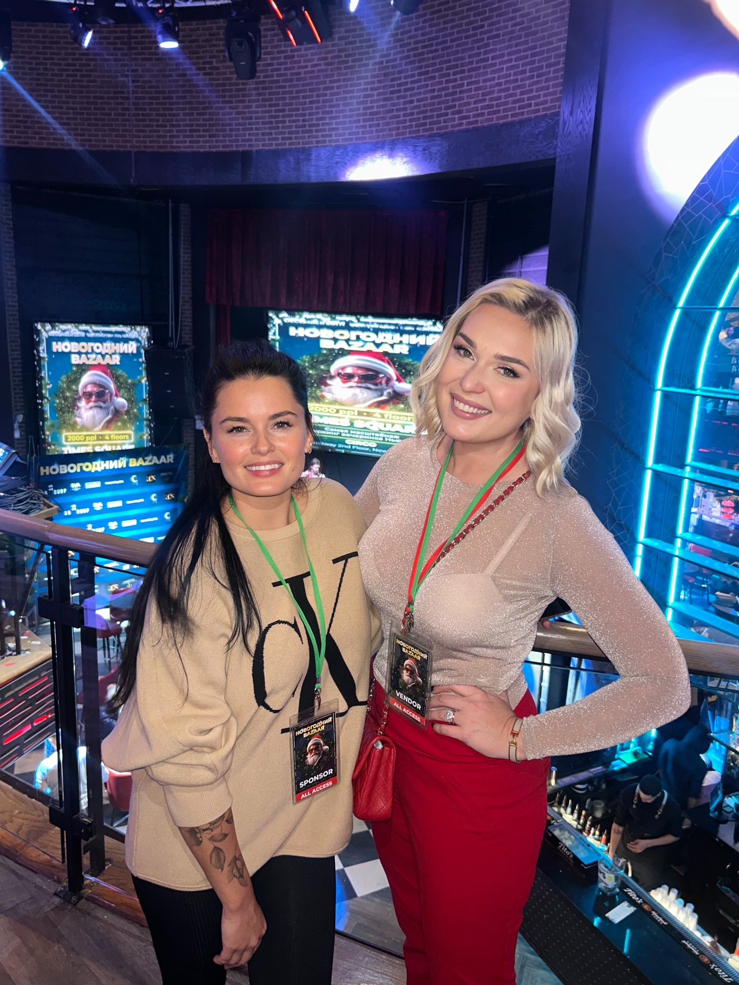Olesya Smith with a sponsor at the Новогодний Bazaar